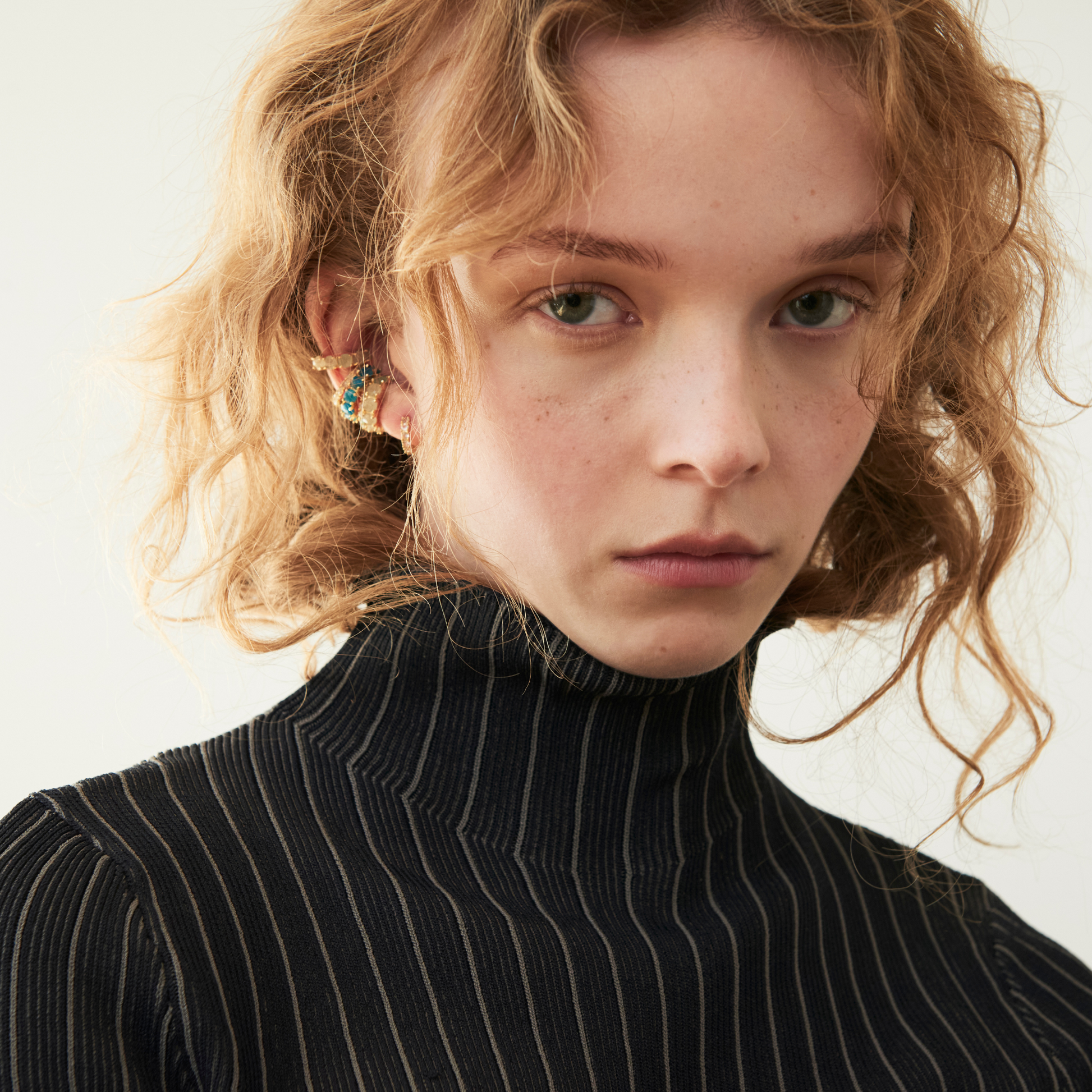 model wearing the 2mm aventurine ear cuff and different gemstone colour 4mm ear cuffs