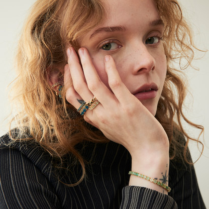 model wearing eternity band rings including the 3mm aventurine eternity band ring