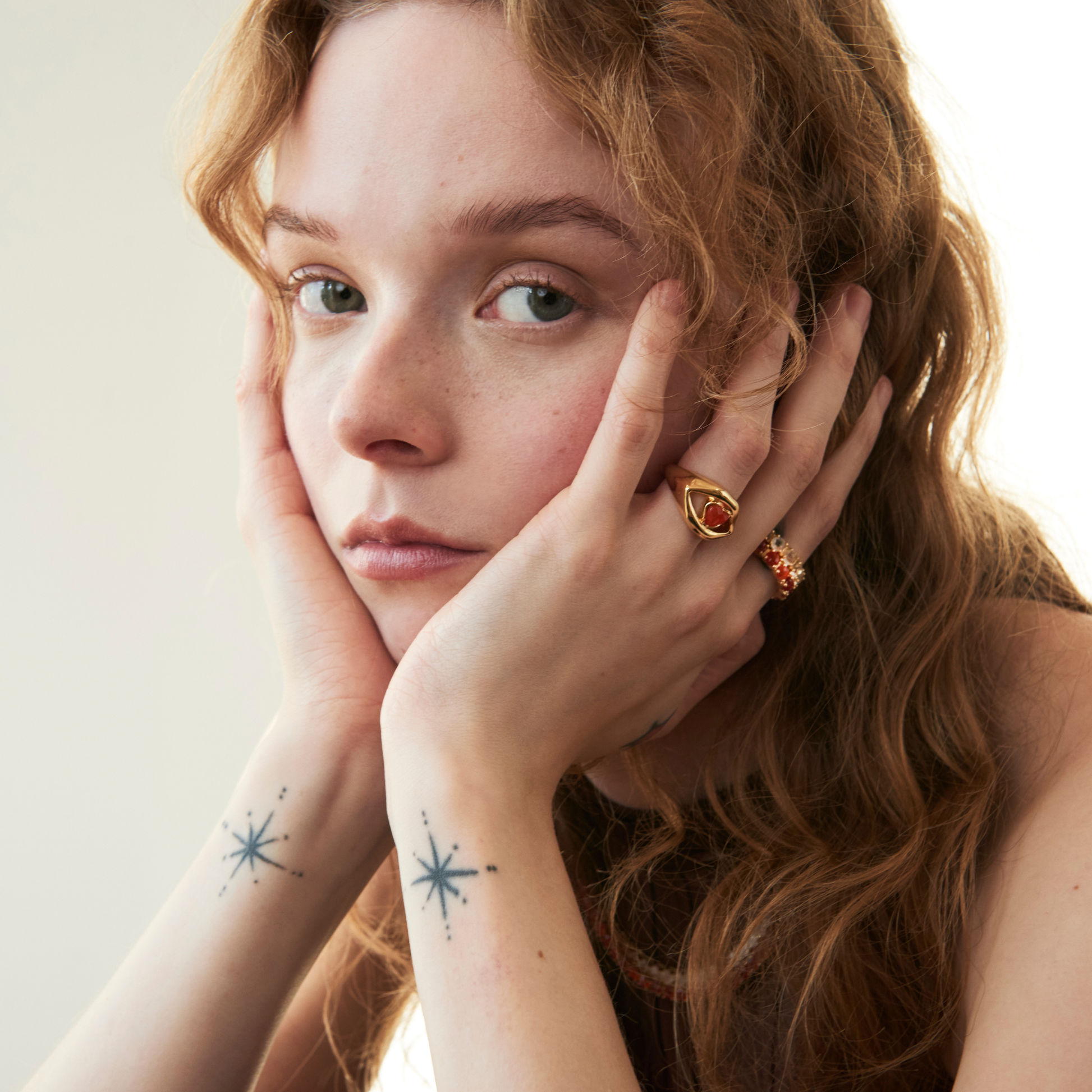 model wearing the carnelian heart lips ring 