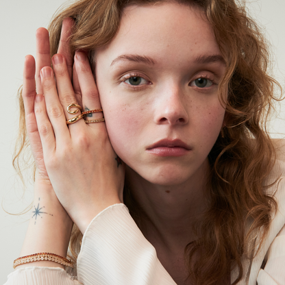 model wearing eternity band rings including the 2mm carnelian eternity band ring 