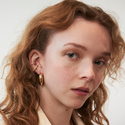 model wearing the beautiful 4mm rose quartz ear cuff and the 2mm rose quartz ear cuff