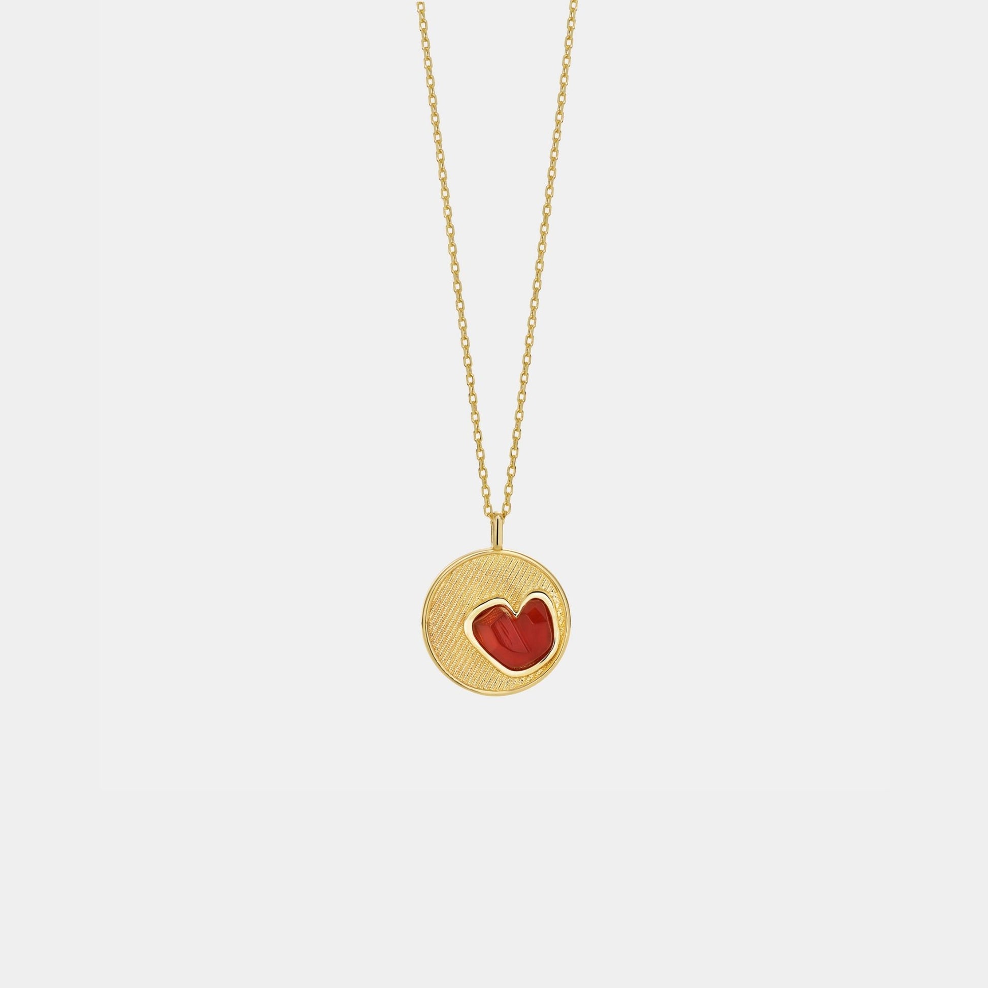 carnelian heart pendant necklace on white background